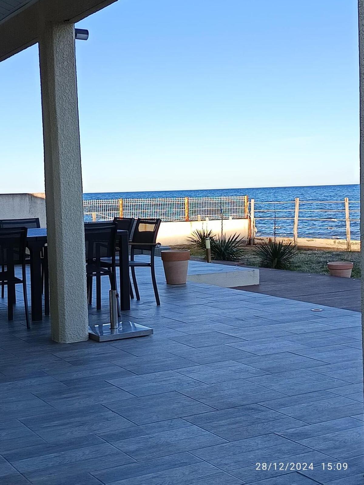 Bord de mer, pieds dans l'eau, vue panoramique Villa San-Nicolao Dış mekan fotoğraf