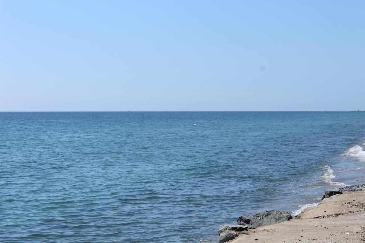 Bord de mer, pieds dans l'eau, vue panoramique Villa San-Nicolao Dış mekan fotoğraf